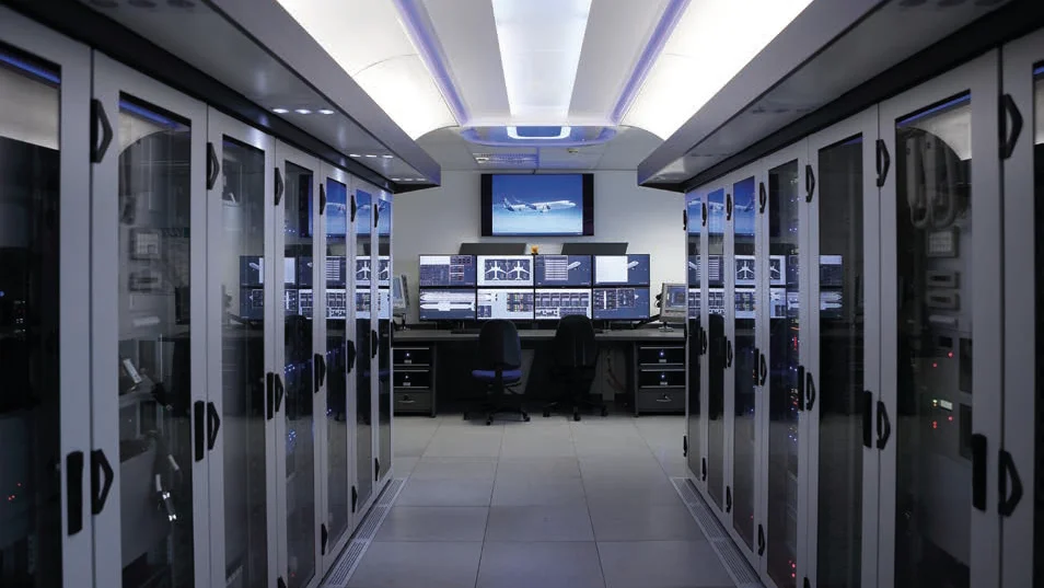 System test rig with cabin ceiling, some original equipment, and control desk (Photo: Airbus / Michael Bahlo) HIL Tests: Case Study Airbus